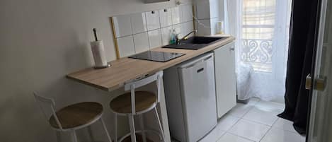 Fridge, microwave, cookware/dishes/utensils
