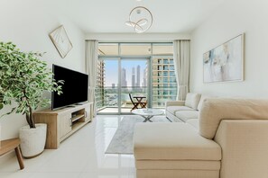 Exclusive Apartment, Non Smoking, Sea View | Living room | 40-inch Smart TV with digital channels - PVH - Sea View 1BR in Beach Vista (Dubai)