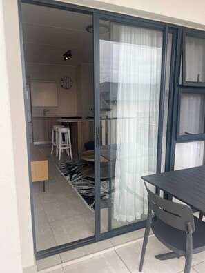 Apartment, 1 Bedroom, Balcony | Outdoor dining - Serene 1-bedroom Apartment in Ballito With Shared Pool (Ballito)