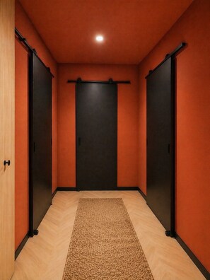 A hallway with a carpet, three doors, and a ceiling light. - House - 2 private suites - cosy - 2'Monaco and port (Beausoleil)