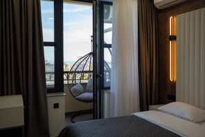 Comfort Apartment, Sea View | In-room safe, blackout drapes, soundproofing, iron/ironing board
