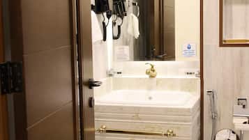 Shower, free toiletries, hair dryer, towels