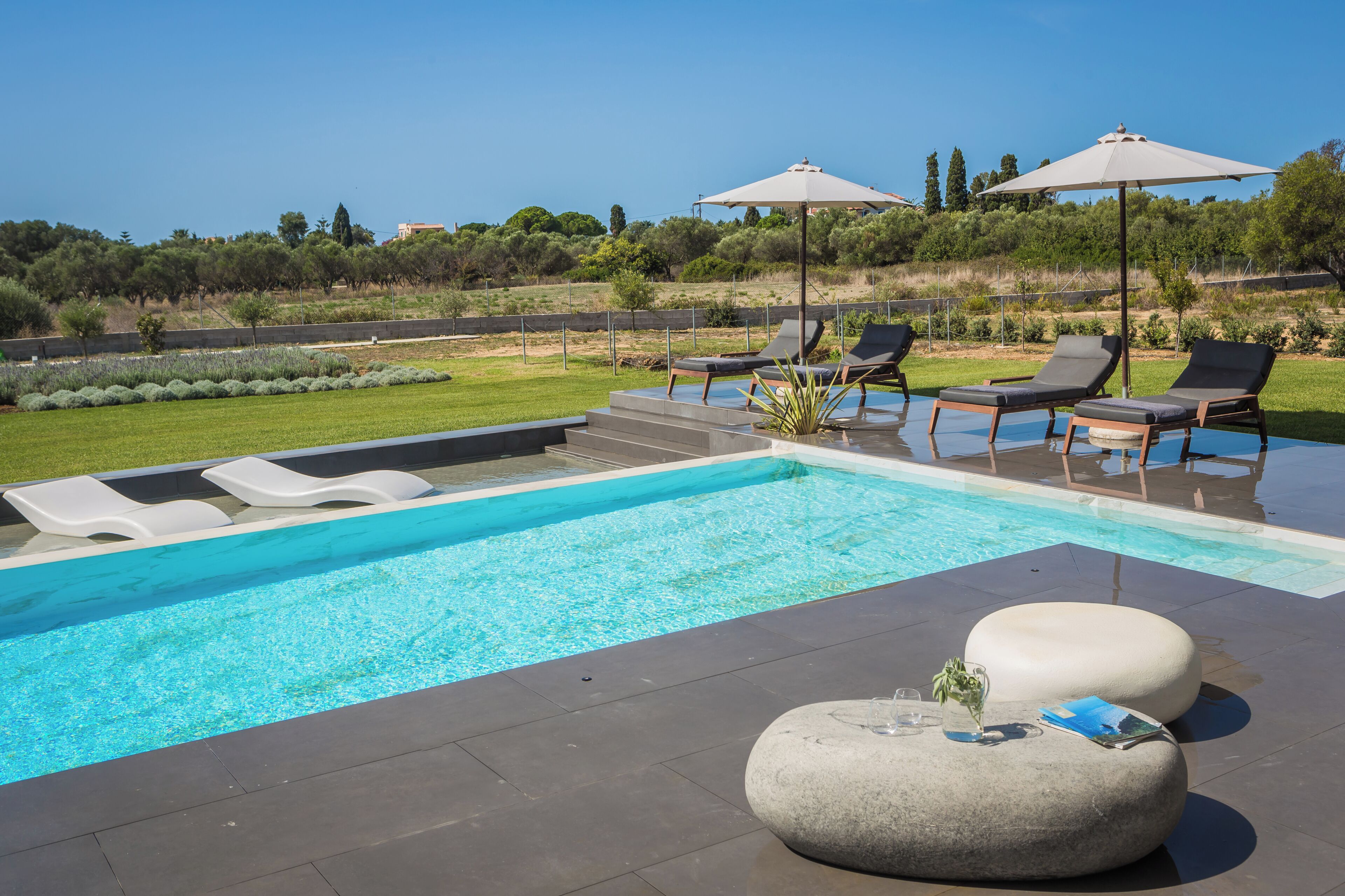 Avgi Luxury Villa | Pool | Seasonal outdoor pool, sun loungers