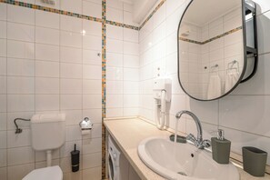 Hair dryer, towels, soap, shampoo