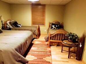 1 bedroom, desk, iron/ironing board, travel crib