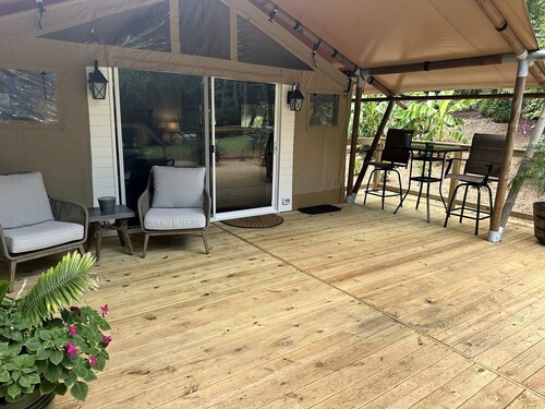 Modern Fully Equipped Safari Tent with Spacious Deck in North Carolina