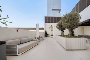 Terrace/patio - Vogue | Luma Park Views JVC Near Circle Mall (Dubai)