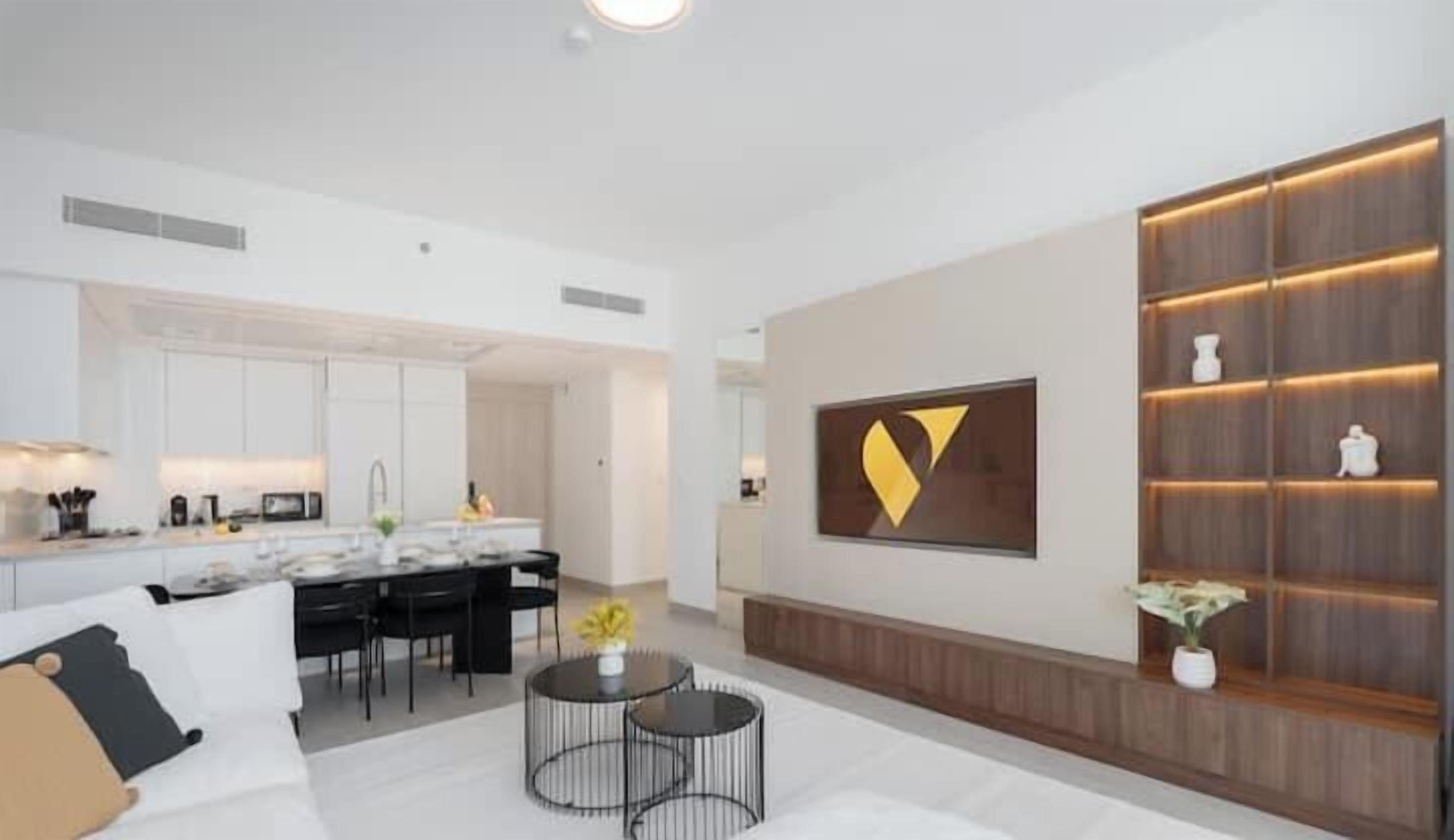 Apartamento superluxo, sacada, vista para o parque | Área de estar | Smart TV 65 polegadas com canais a cabo