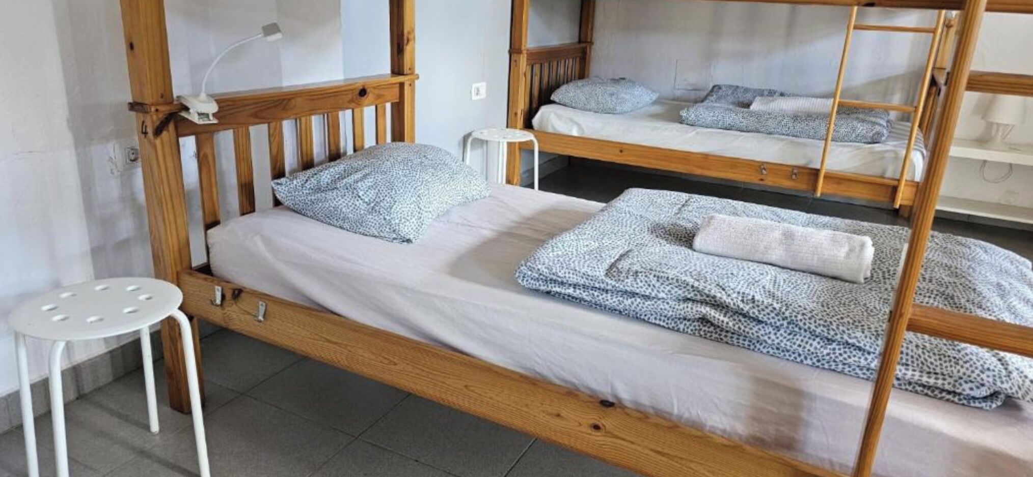 Dundyner, sengetøy og rullestolvennlig