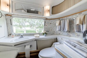 Jetted bath, hair dryer, towels, soap