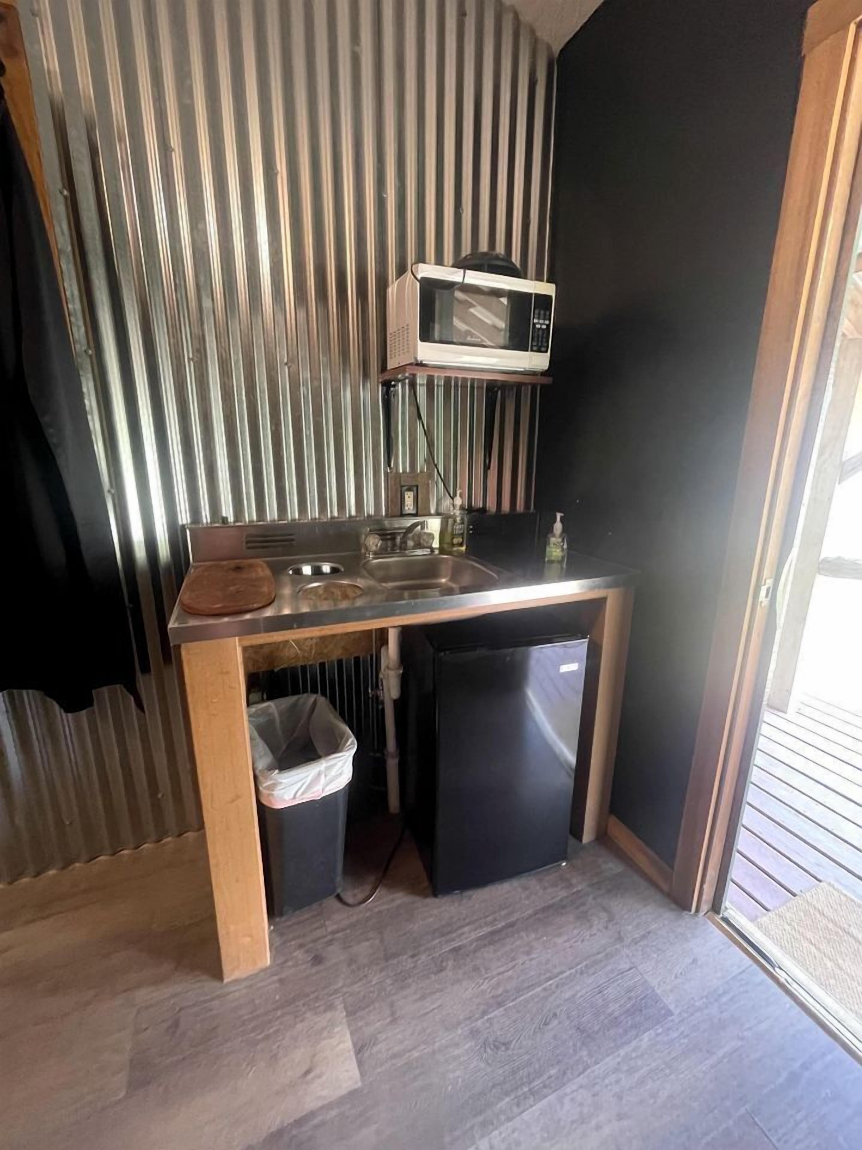 Fridge, microwave, dining tables