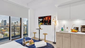 Eenvoudige studio suite, 1 queensize bed, niet-roken, uitzicht op de stad