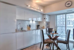 Luxury Suite, 2 Bedrooms, Non Smoking, 2 Bathrooms | Private kitchen | Fridge, microwave, oven, stovetop
