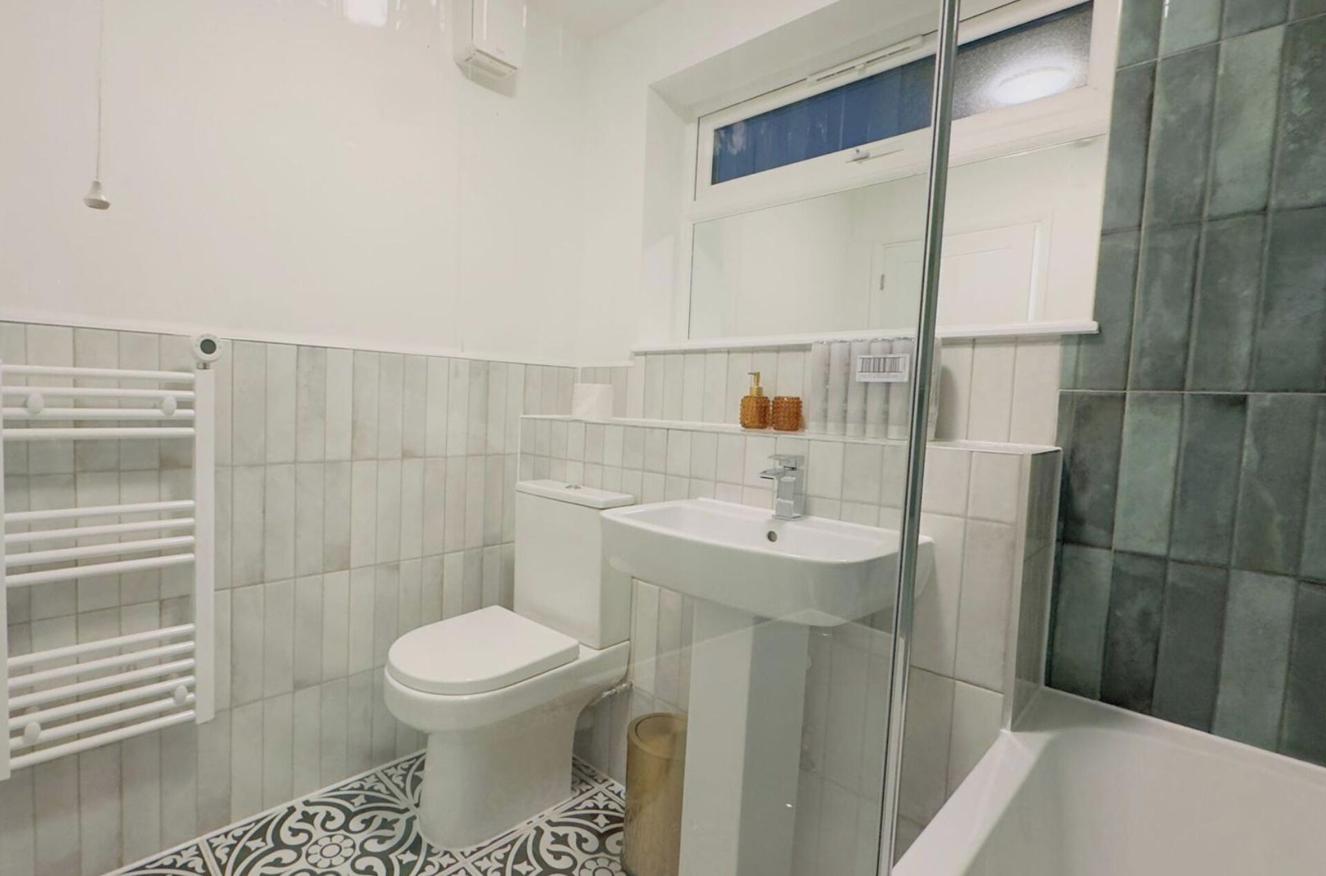 Combined shower/bathtub, deep-soaking bathtub, towels