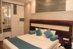 Deluxe Double Room, City View | Desk, laptop workspace, soundproofing, iron/ironing board - Hotel Gurveer Royal (Lucknow)