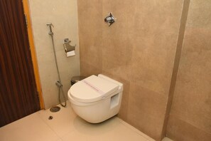 Deluxe Double Room, City View | Bathroom | Shower, free toiletries, hair dryer, slippers