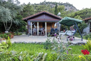Casa família, vista para o jardim | Fachada