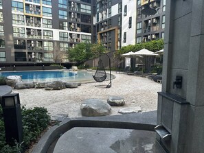 Condo, 1 Bedroom, Accessible, Balcony | Pool | Outdoor pool - BKK Oasis Stylish & Cozy Condo Near MRT 200m (Bangkok)