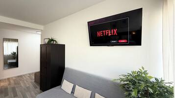 55-inch Smart TV with digital channels, Netflix, streaming services