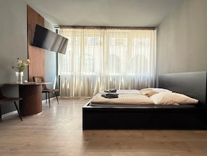 Blackout drapes, iron/ironing board, free WiFi, bed sheets