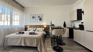 Blackout drapes, iron/ironing board, free WiFi, bed sheets