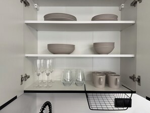 Full-size fridge, stovetop, espresso maker, coffee/tea maker