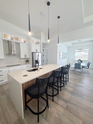 Dining - Newly Built Modern Vacation Home 4 BR/3 BA Your Own Heated Pool, Lanai on Canal (Cape Coral)