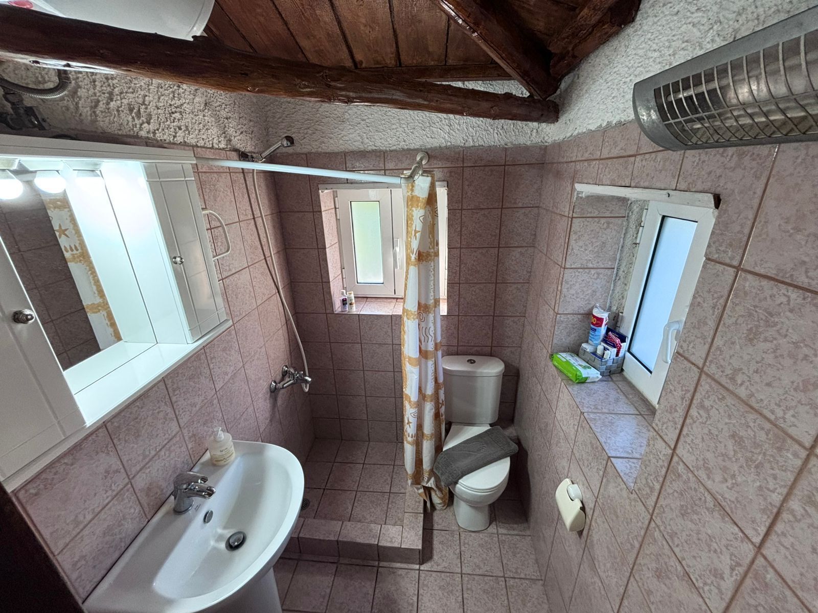 Hair dryer, towels, soap, toilet paper