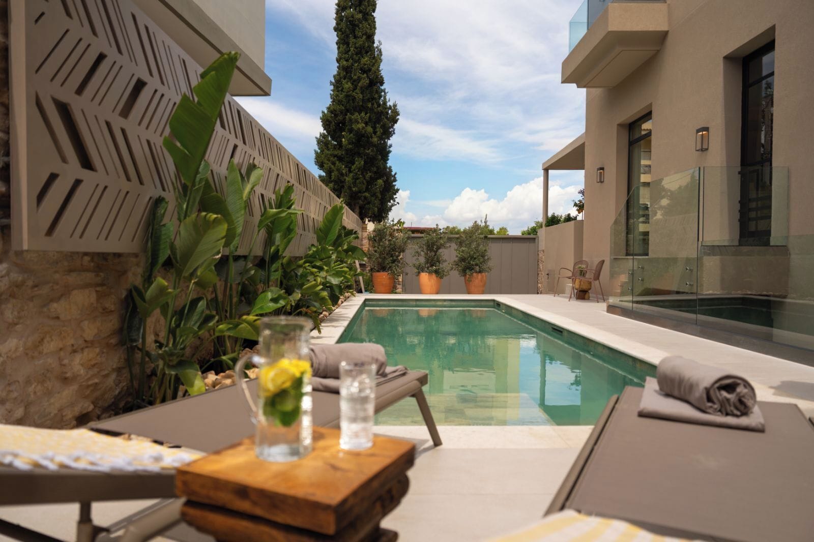Indoor pool, outdoor pool, open 11:00 AM to 8:00 PM, pool umbrellas