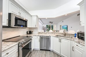 Fridge, microwave, oven, stovetop - Renovated 2BR in Pelican Bay - Private Beach Access & Amenities (Naples)