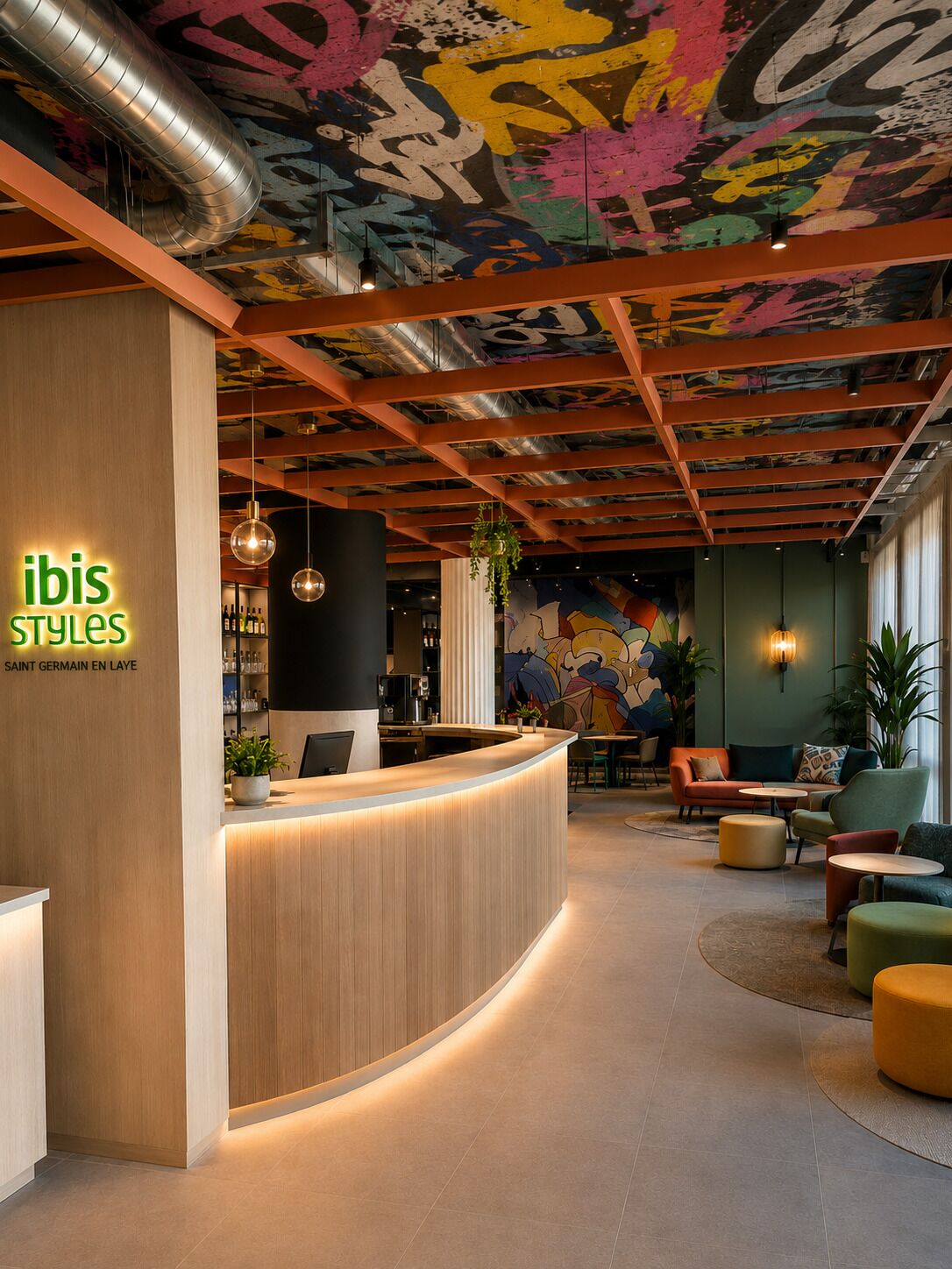 A modern interior with a curved reception desk, a colorful mural on the ceiling, and a seating area with various chairs and tables.