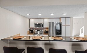 Private kitchen - Timeless Townhome overlooking Grand Lake with beautiful unobstructed water views (Afton)