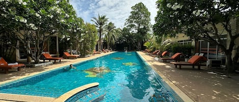 2 outdoor pools, open 8:00 AM to 10:00 PM, pool umbrellas, pool loungers