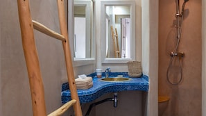 Shower, hair dryer, towels, toilet paper