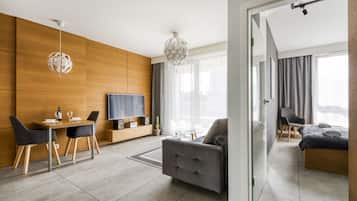 Appartement Supérieur, balcon, vue ville | Coin séjour