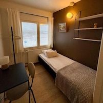 Habitación individual, vistas al parque | Cortinas opacas