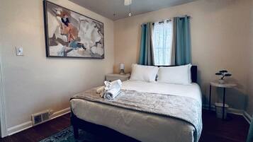 2 bedrooms, desk, iron/ironing board, travel crib