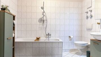 Hair dryer, towels, soap, toilet paper
