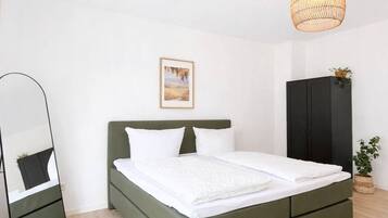 2 bedrooms, desk, iron/ironing board, travel crib