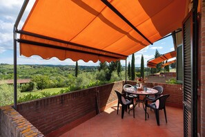 Apartment, Balcony, Pool View | Outdoor dining