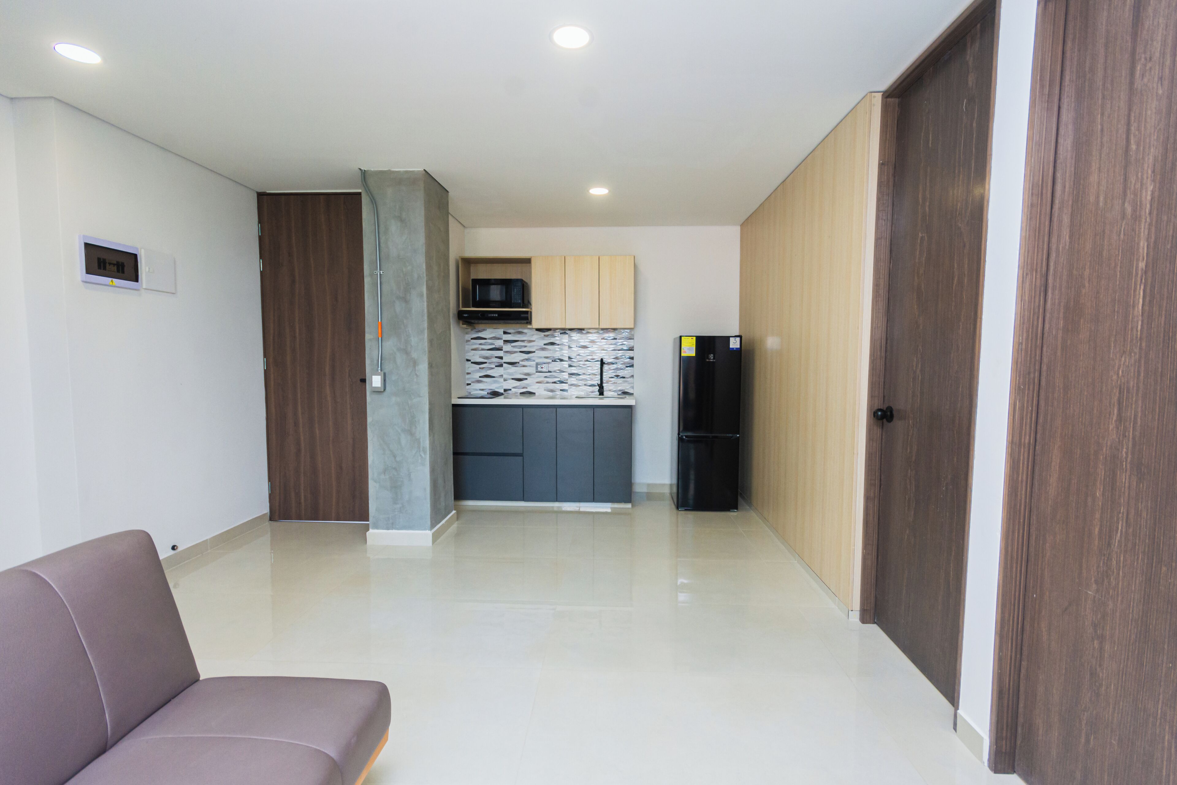Loft Keluarga, balkon, pemandangan kota | Area keluarga | Televisi layar datar 40-cm dengan saluran TV digital