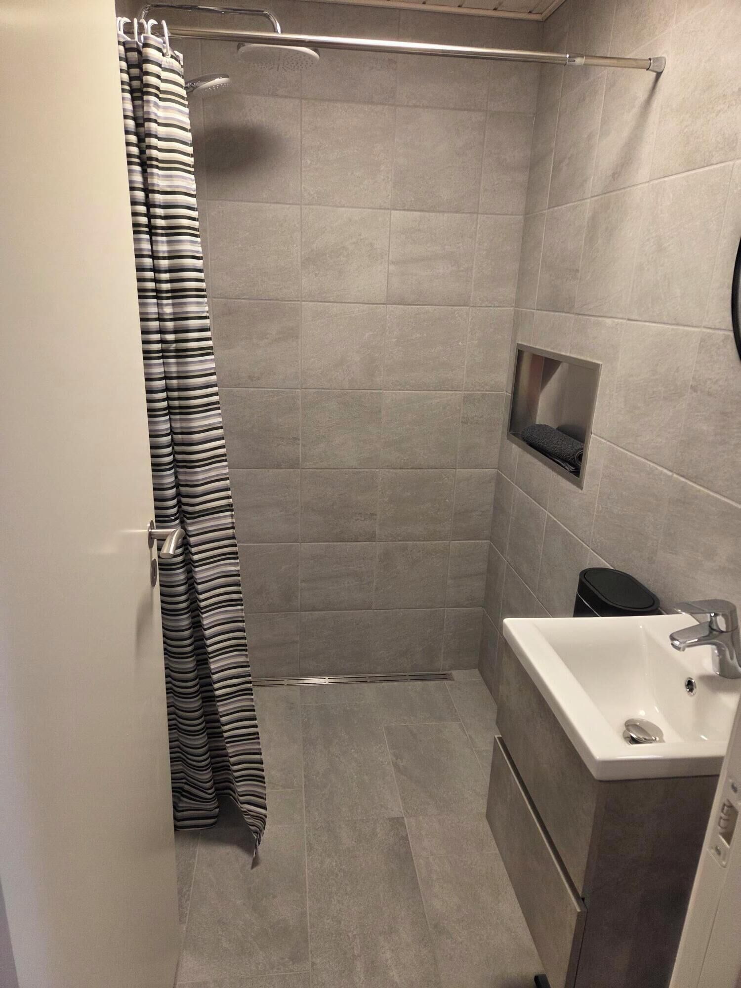 Shower, towels, soap, toilet paper
