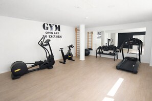 A gym with cardio machines, free weights, and a treadmill. - Ap1142 in Denia With 1 Bedrooms and 1 Bathrooms (Denia)