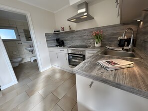 Private kitchen - Holiday Apartment 'Meerblick' with Private Terrace, Garden & Wi-Fi (Bastorf)