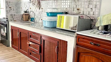 Apartment, 2 Bedrooms, Balcony | Private kitchen | Full-size fridge, microwave, oven, stovetop. Villa Saint Malo