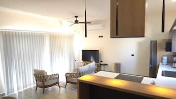 Departamento, vista parcial al mar | Área de sala de estar