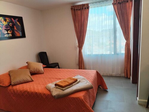 Apt with a view of the volcano-Carnival Trail. Modern and central.