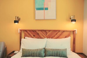 Iron/ironing board, travel crib, free WiFi, bed sheets