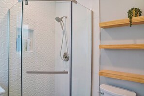 Shower, hair dryer, towels, soap