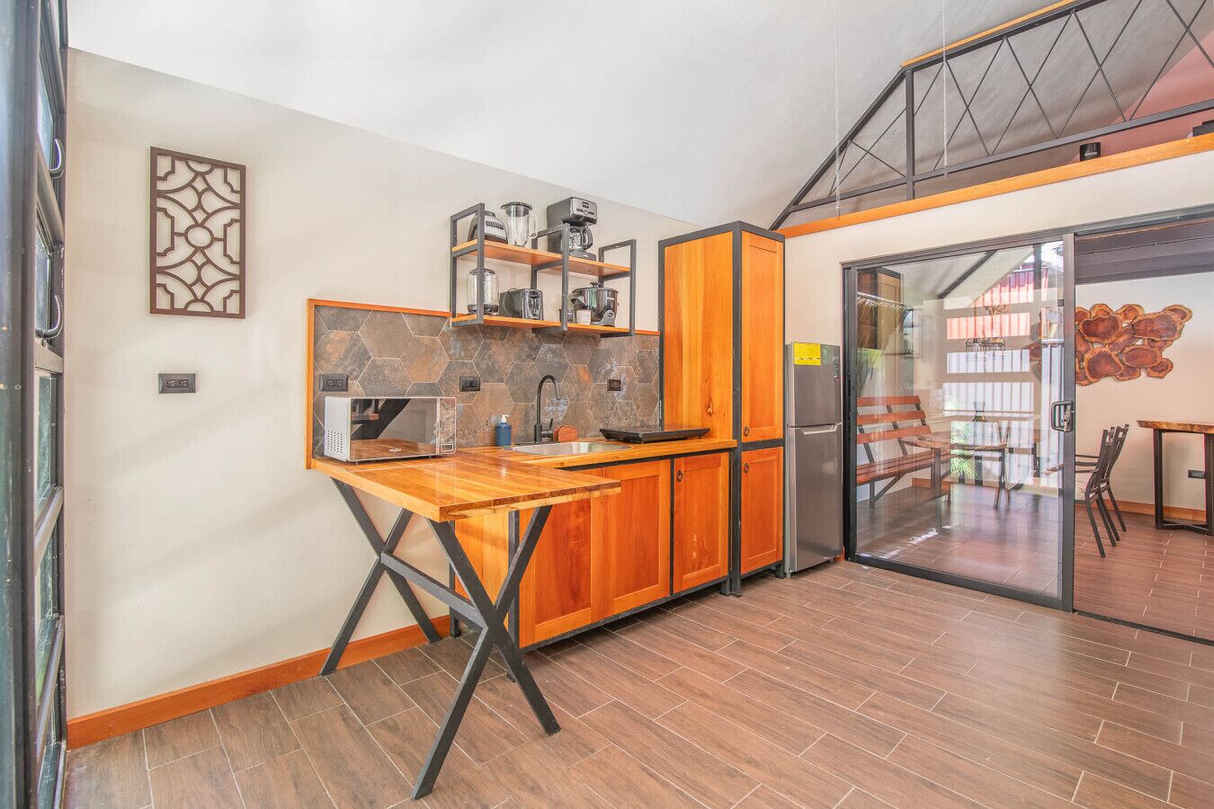 Fridge, toaster, dining tables
